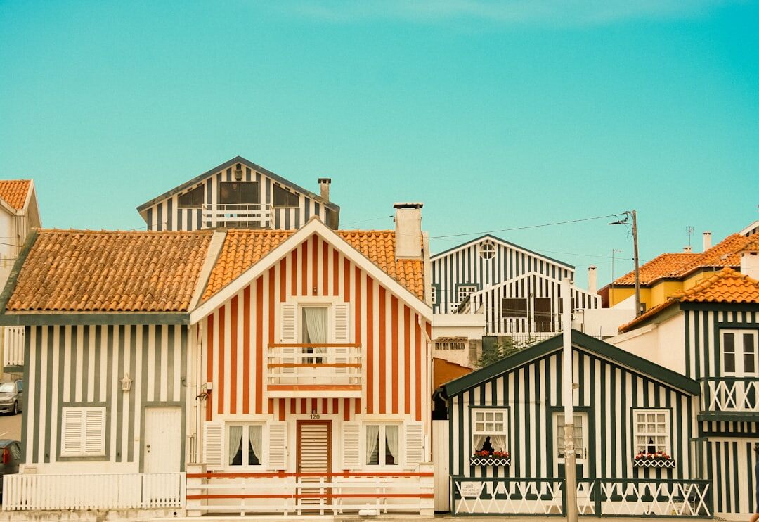 Narrow street with traditional colorful houses in a Danish fishing village
